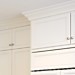 AFTER high cabinets stacked to the ceiling for storage