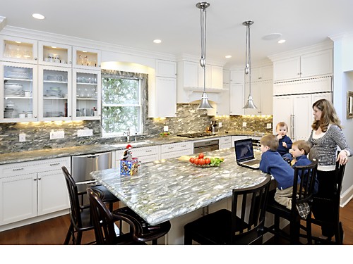 Laura Kay and her 3 sons in their finished kitchen
