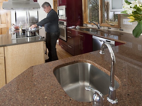AFTER prep sink located away from the cooking area to make room for a second person in the kitchen