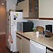 BEFORE basic cabinets and white appliances
